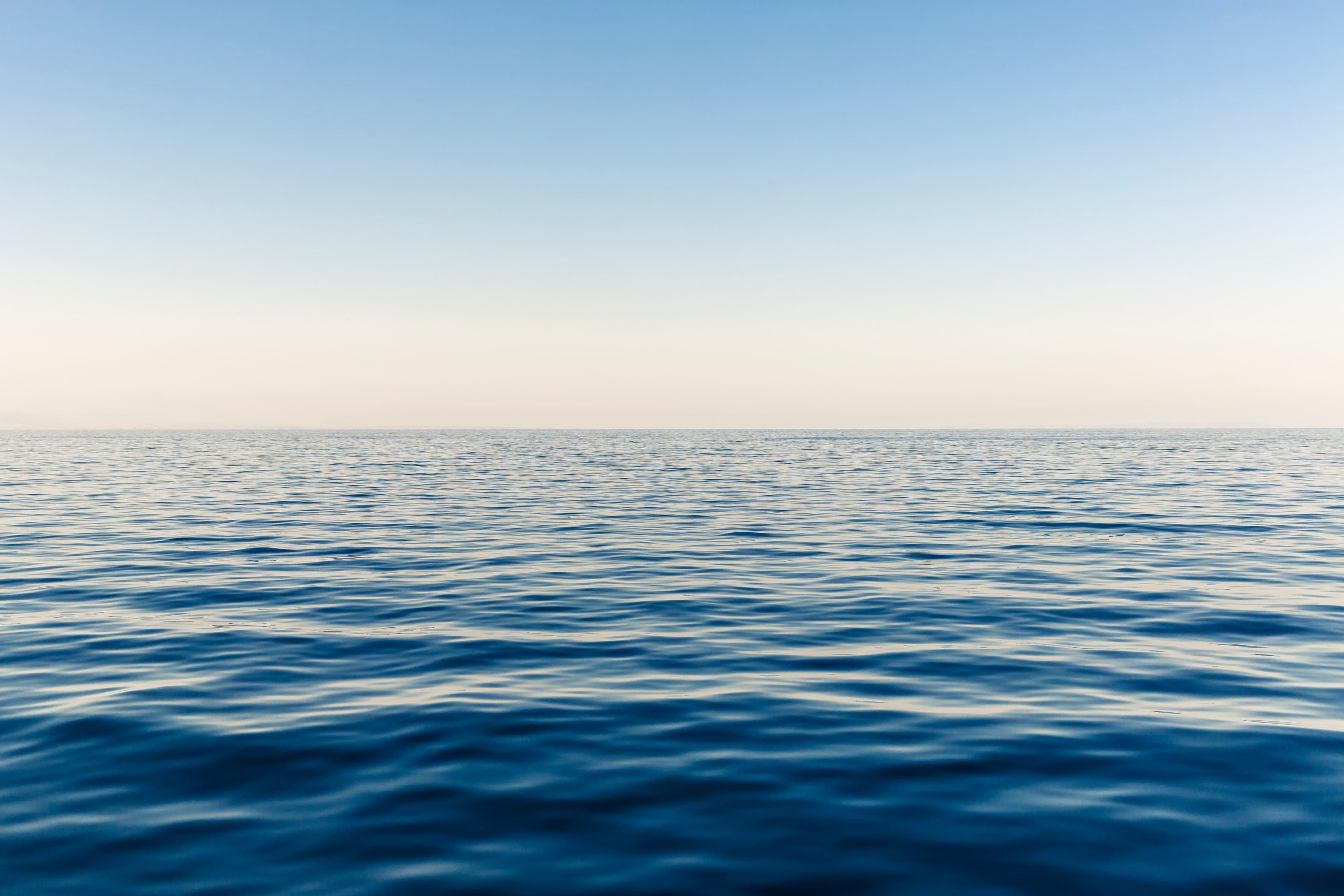 A large body of water and sky
